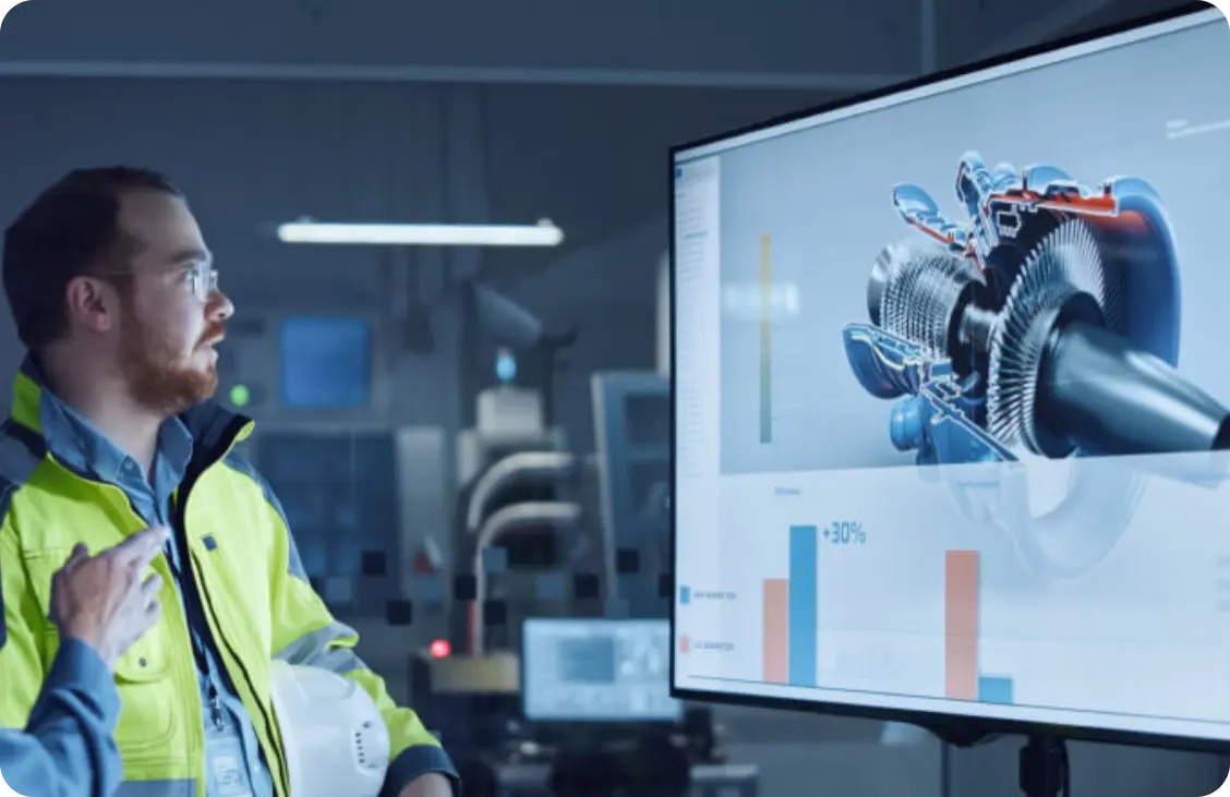 Man looking at a Manufacturing KPI Dashboard