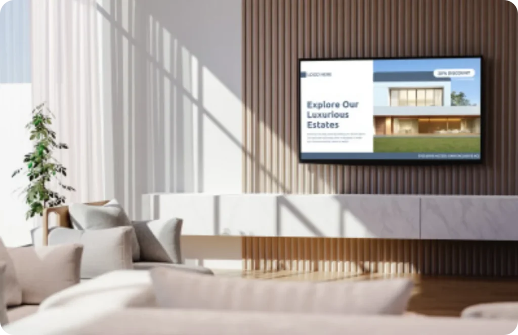 A screen mounted inside a house displaying real estate content powered by Wioplex's digital signage software.